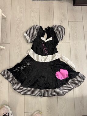 Spirit Halloween broken doll costume.